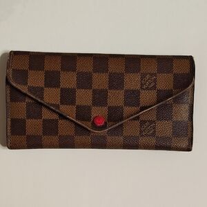 Louis Vuitton Checkered Brown Wallet with Red Accent